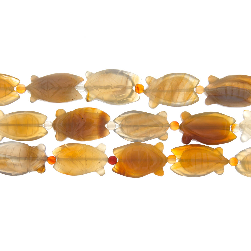 CARNELIAN CRAVED 16 X 22 X 8 MM STRAND