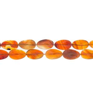 CARNELIAN OVAL TWISTED 15 MM X 25 MM STRAND